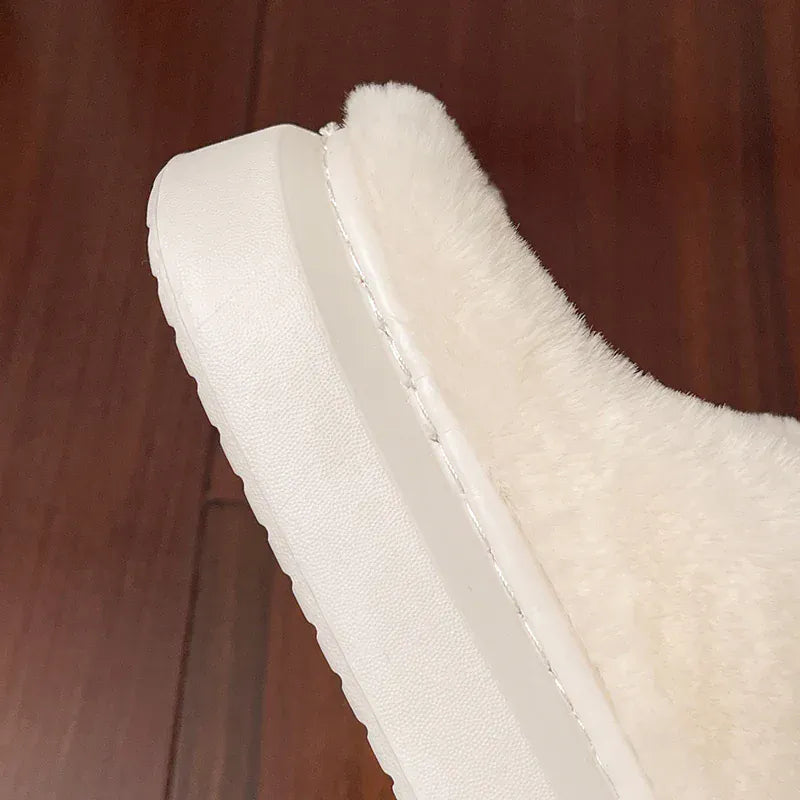 Chausson femme fourrure -  Papillon